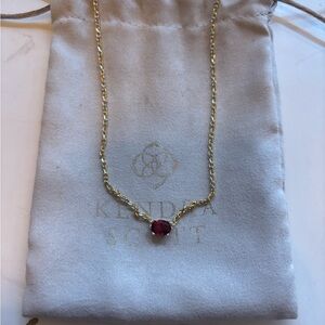 Kendra Scott Gold and Red Necklace with Elegant Design